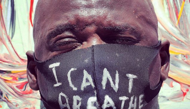 "من نمی توانم نفس بکشم" یکی از شعارها و جملات پرتکرار در اعتراضات اخیر آمریکا است. - منبع: USA TODAY