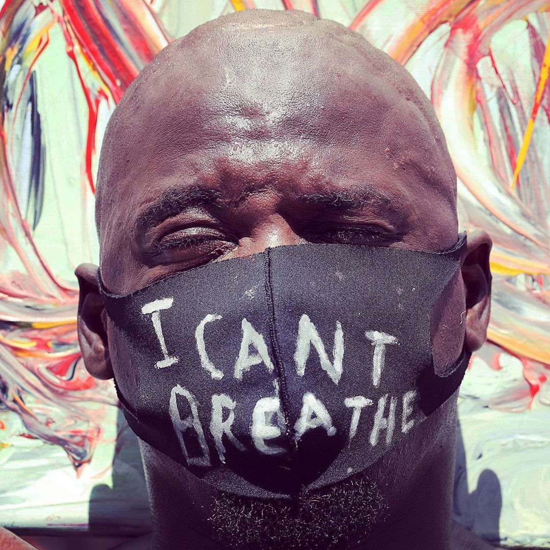 "من نمی توانم نفس بکشم" یکی از شعارها و جملات پرتکرار در اعتراضات اخیر آمریکا است. - منبع: USA TODAY